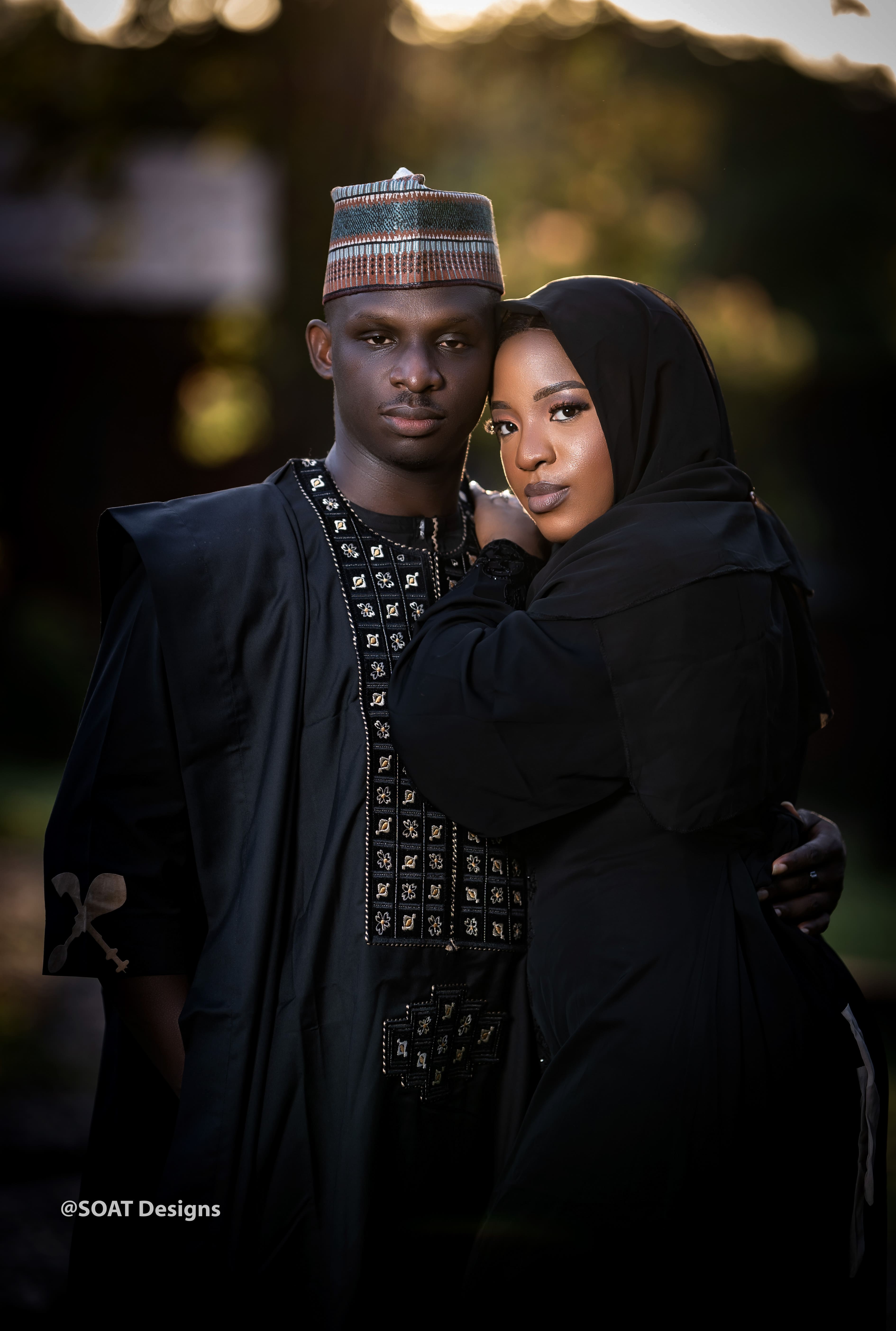 Shalom and Prudence sharing a joyful laugh during their engagement photoshoot